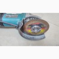 Купити дешево кутову шліфмашинку Makita 9558HN, фото, опис