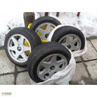 Літню резину Firestone 195/60 R15 + титани (опелівські)