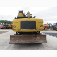 Грейферный перегружатель Caterpillar M318D