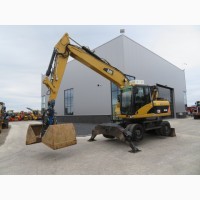 Грейферный перегружатель Caterpillar M318D