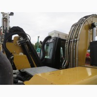 Грейферный перегружатель Caterpillar M318D