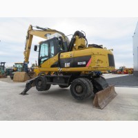 Грейферный перегружатель Caterpillar M318D