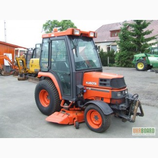 Kubota ST 30 коммунальный трактор