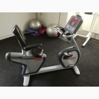 Велотренажери Technogym NEW RECL EXC 700TV-T та Star Trac