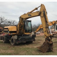 Продаем колесный экскаватор с отвалом Caterpillar M315, 0, 85 м3, 2002 г.в