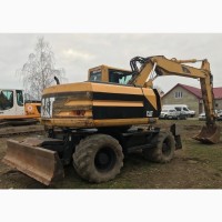 Продаем колесный экскаватор с отвалом Caterpillar M315, 0, 85 м3, 2002 г.в