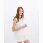 Zara сток .Предлагаем купить оптом женскую и детскую одежду Zara.