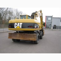 Колесный экскаватор Caterpillar M322С